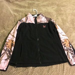 Woman’s pink and black fleece jacket